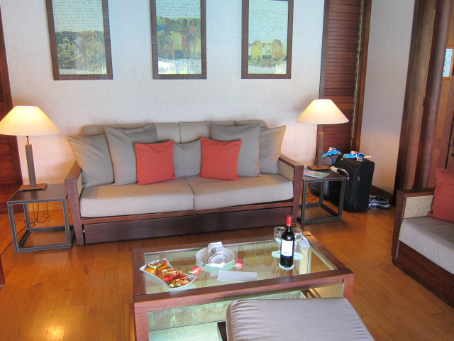 View of the living room set up with fruit and wine
