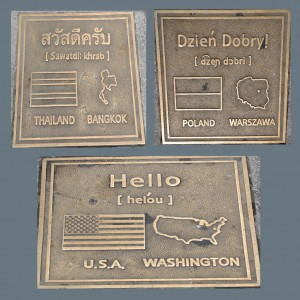 Country Plaques in sidewalk.