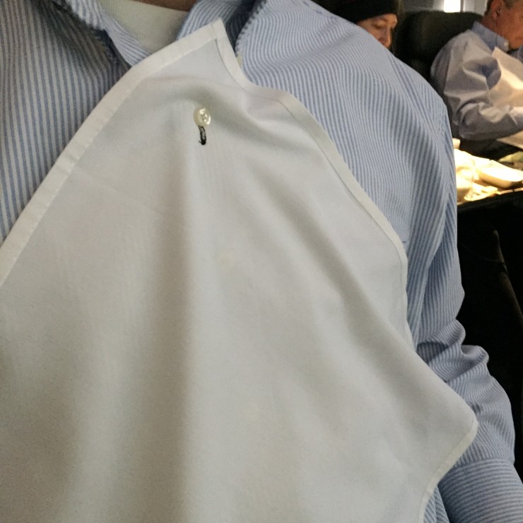 Sporting the buttonhole napkin, and look, in the background another is doing the same!